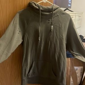 Green ripped sweatshirt